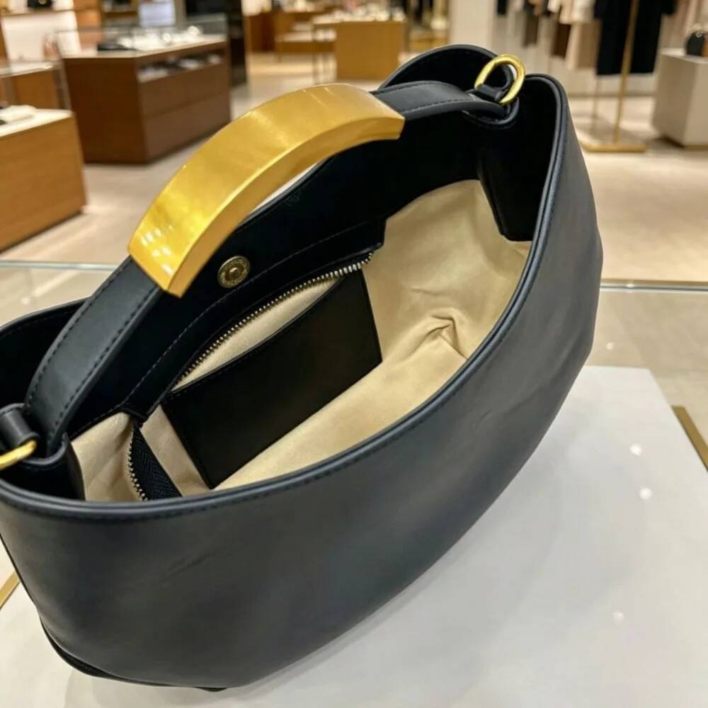 Demi-cercle Women Golden Lette - đánh giá và giá Luxury Bags To Sell